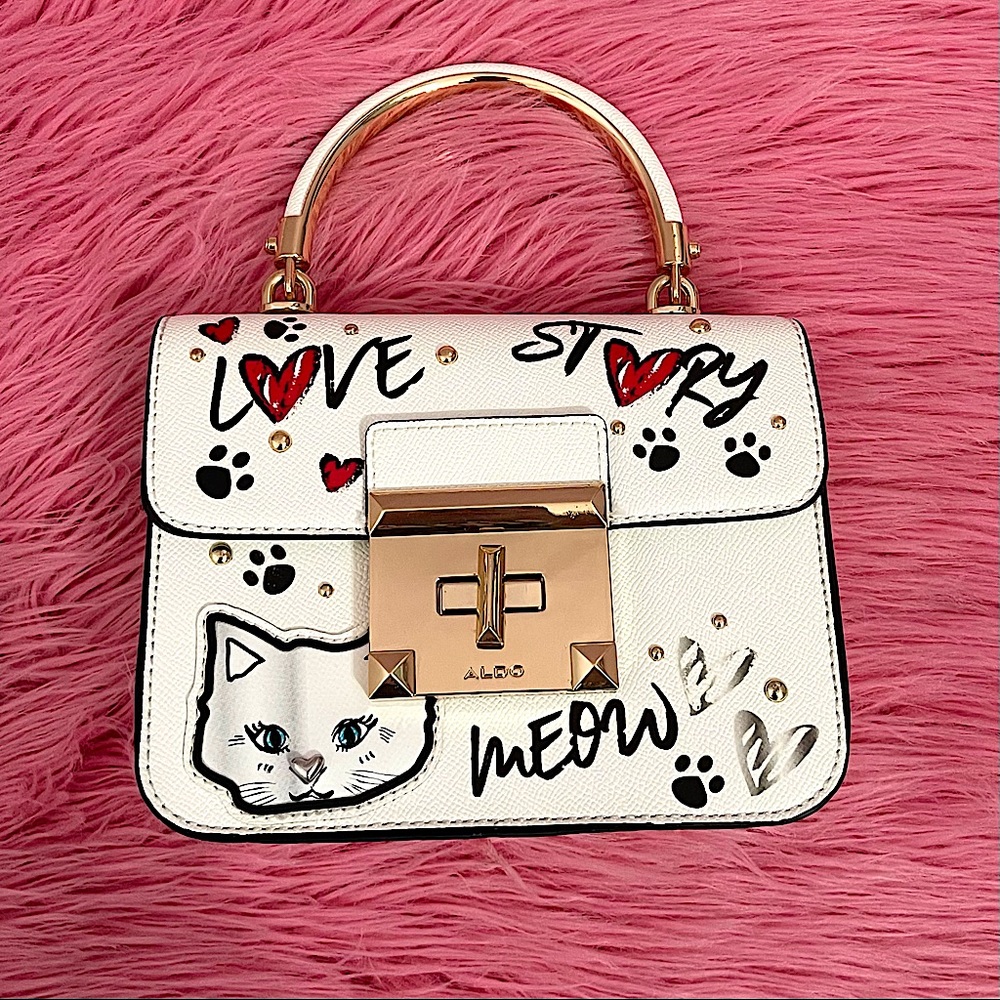 ALDO small white purse with a strap, like new great condition, accepting offers!